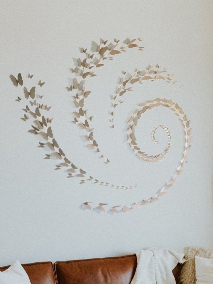 spiraal van vlinders op de muur