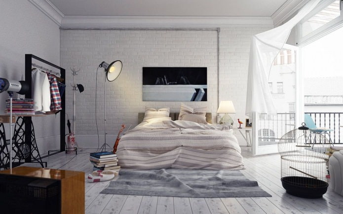 witte bakstenen muur in de slaapkamer