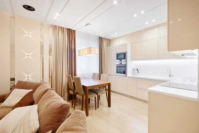 verlichting en decoratie in het keukeninterieur in beige tinten