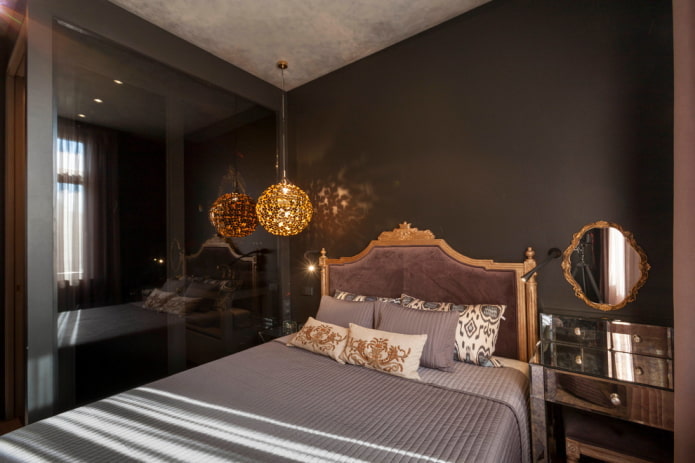 decoratie en verlichting in de slaapkamer in zwarte tinten