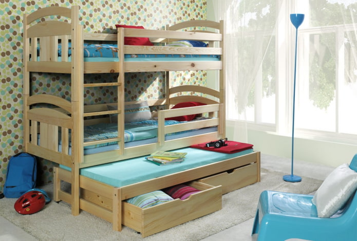 model met twee niveaus in een kinderkamer voor drie kinderen