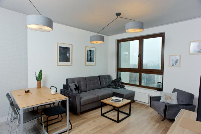 klein bankmodel met een ottomane in het interieur