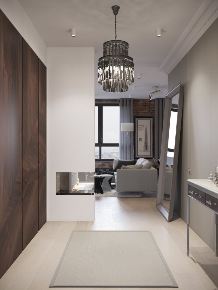 ontwerp van een hal gecombineerd met een woonkamer met een open haard