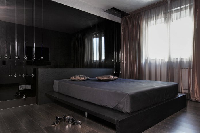 meubels in het slaapkamerinterieur in zwarte tinten