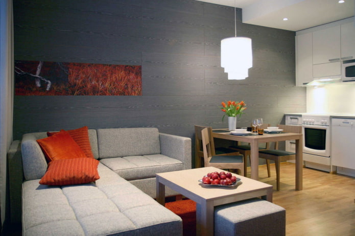 grijze hoekbank in de hoek van de kamer