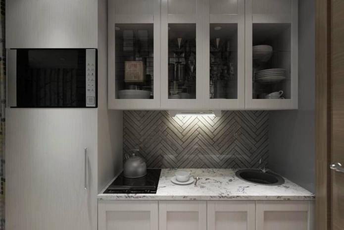 foto van het keukenontwerp in een studio-appartement van 14 m?.