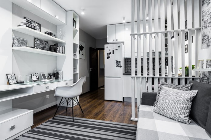 ontwerp van een werkruimte in het interieur van een studio-appartement