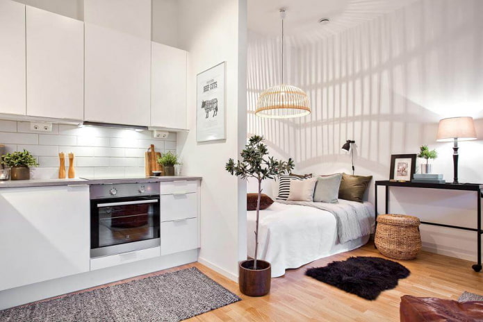 slaapgedeelte in het interieur van een studio-appartement
