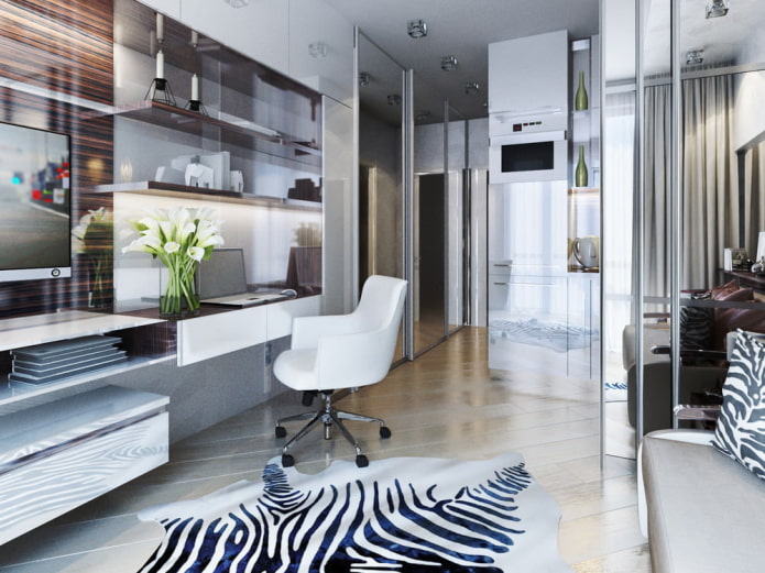 ontwerp van een werkruimte in het interieur van een studio-appartement