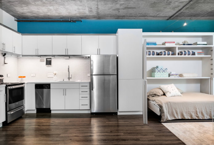 Langwerpige loftstudio en een transformerend bed