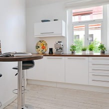 Ontwerp van een kleine keuken met een bar - 9