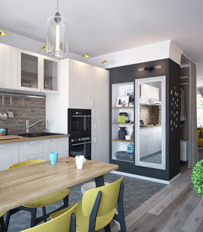 Ontwerp van een keuken in een eenkamerappartement met een uitzwaaiend ontwerp