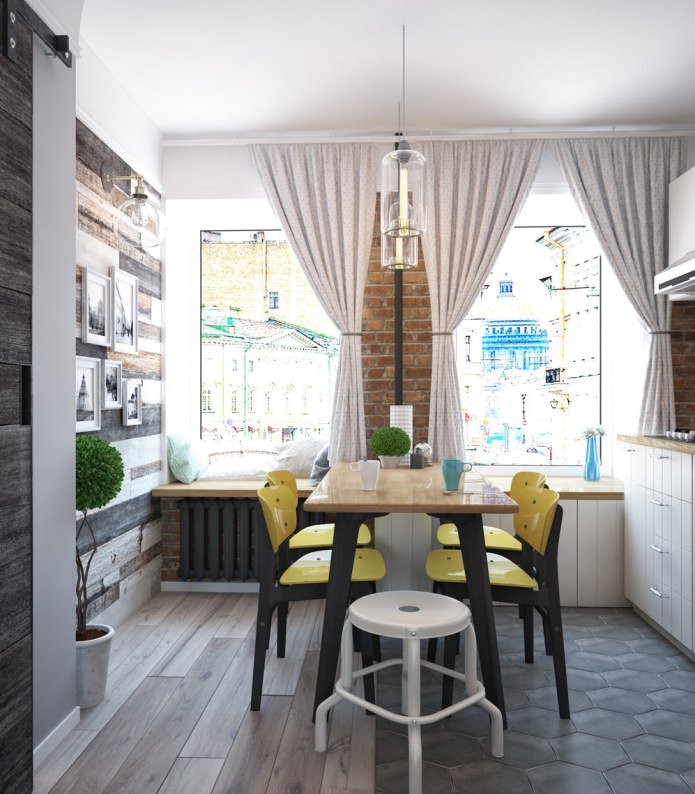 Keukenontwerp in een eenkamerappartement met schommel