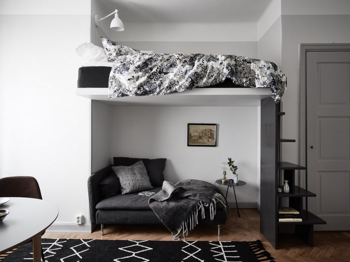 meubelopstelling in een eenkamerappartement met een nis