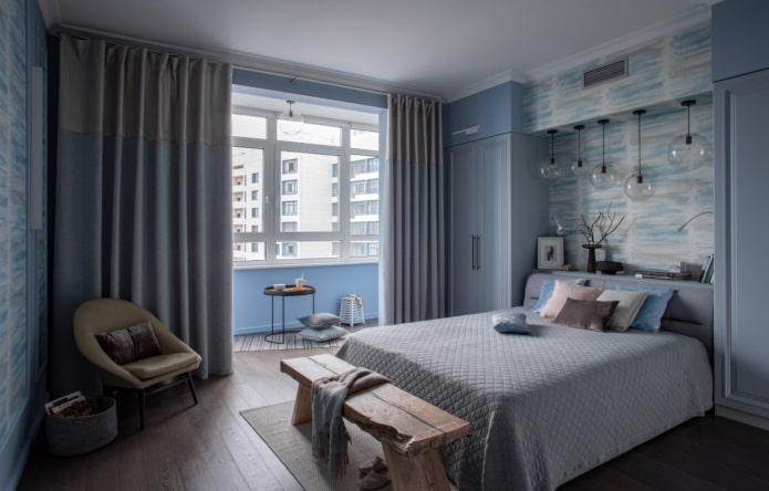 blauwe slaapkamer met balkon