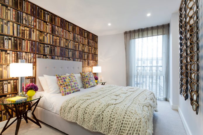 3D-behang met boeken in de slaapkamer