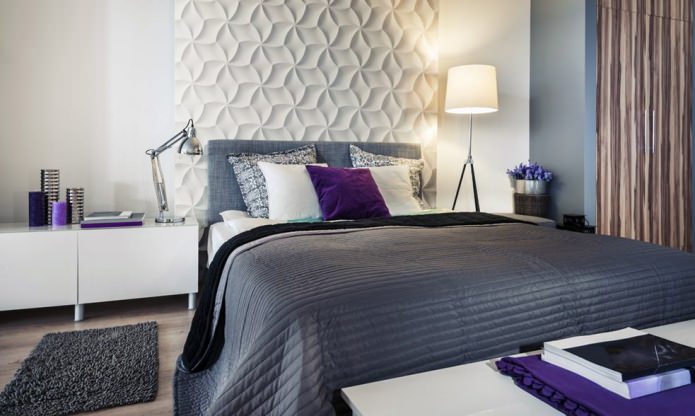 witte 3D-panelen op de muur in de slaapkamer