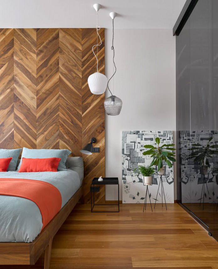 Slaapkamer met houten wand