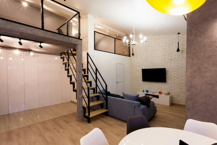 interieurontwerp van een studio met twee verdiepingen