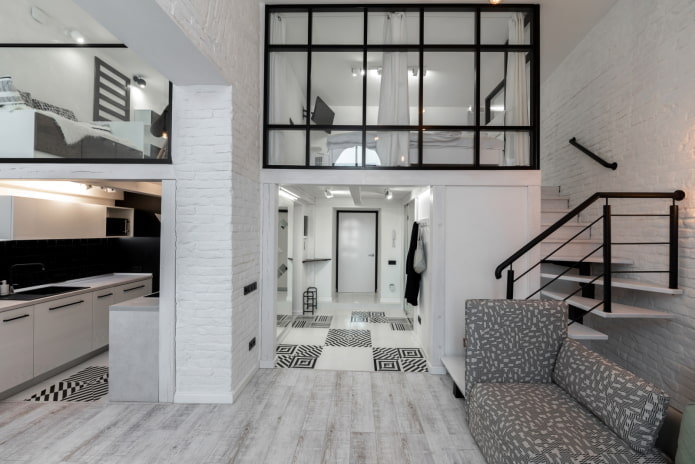 interieurontwerp van een studio met twee verdiepingen
