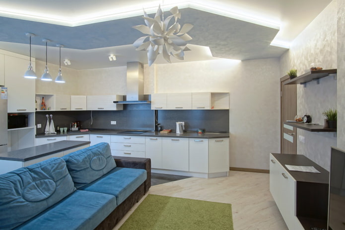 ontwerp met twee niveaus in het interieur van een keuken-woonkamer