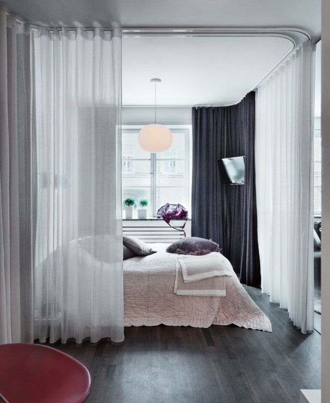 slaapkamer in een tweekamerappartement in Europese stijl