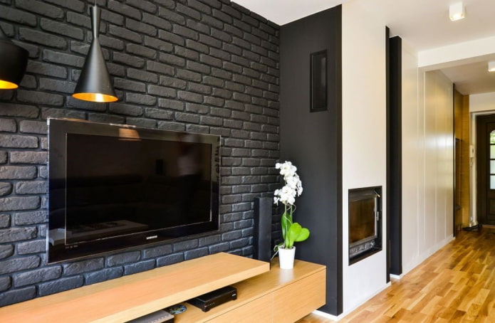 zwarte gipstegels aan het interieur
