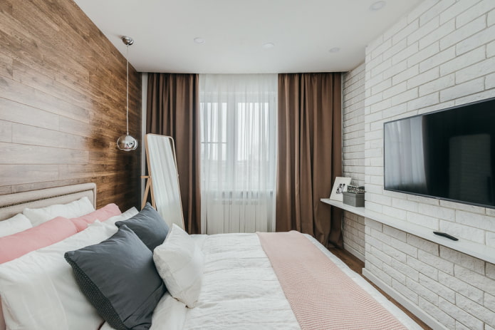 gipstegels in het interieur van de slaapkamer