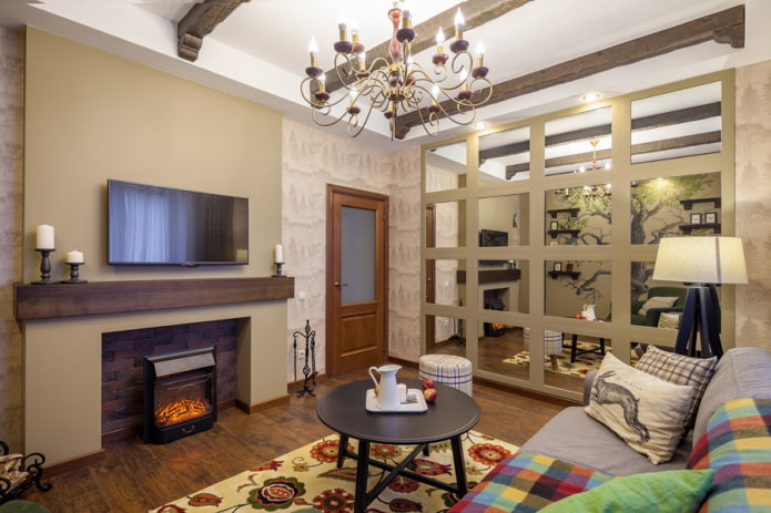 open haard en tv in het interieur van een kleine woonkamer