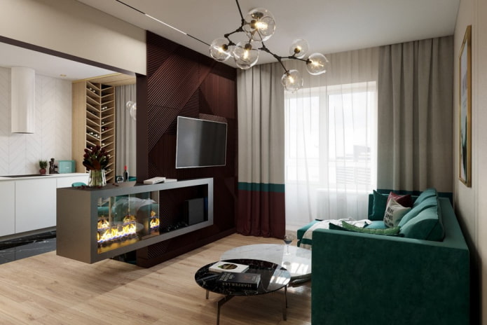 open haard en tv in het interieur van de woonkamer in het appartement