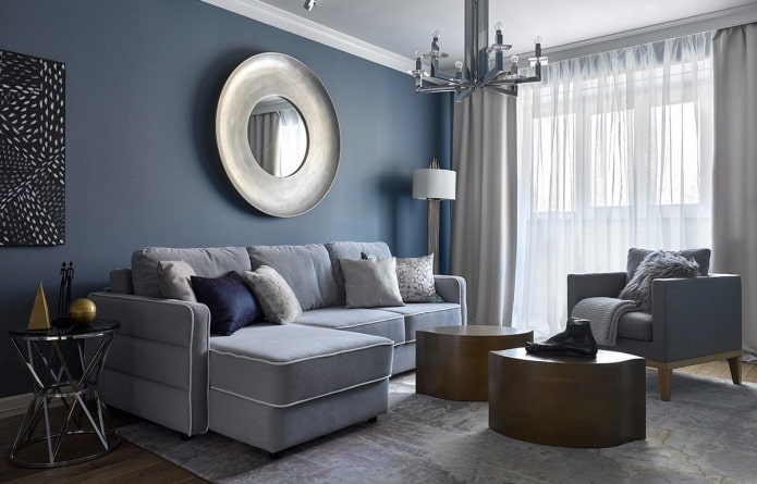 interieur van een grijsblauwe woonkamer