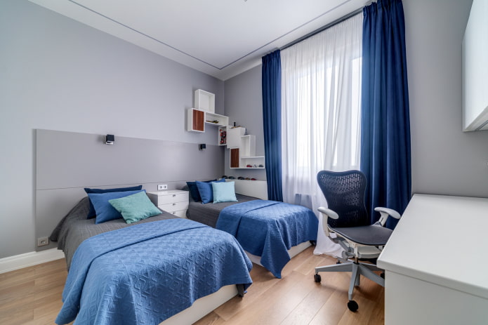 interieur van een blauwgrijze kinderkamer