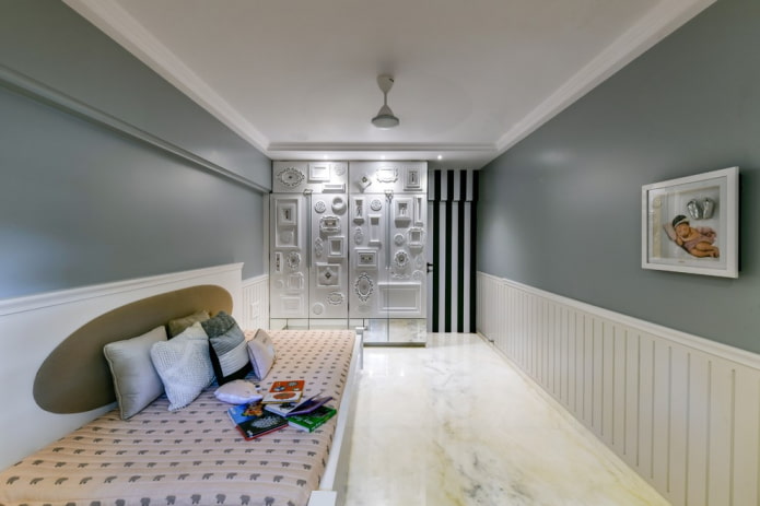 ontwerp van een witte en grijze kinderkamer