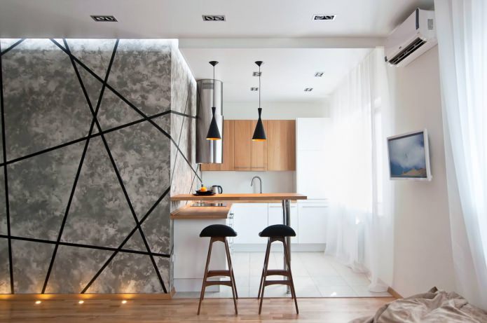 De keuken en woonkamer scheiden met een bar
