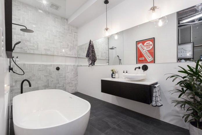 badkamerinterieur met een aan de muur bevestigde wastafel in een moderne stijl