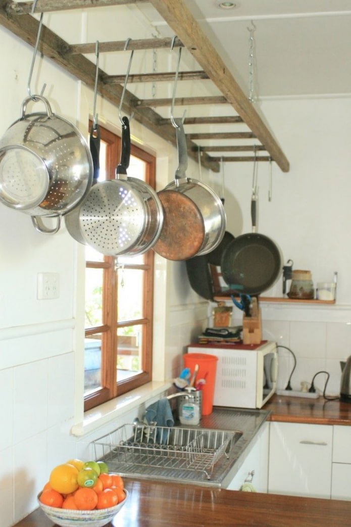 Frame voor koekenpannen van een ladder