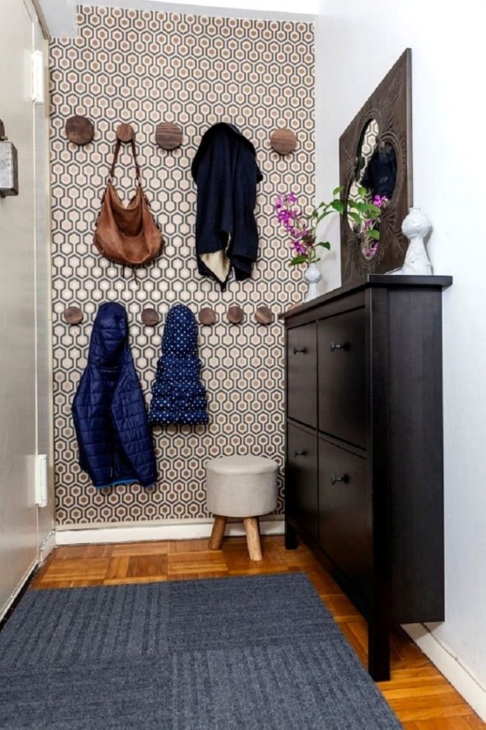 ronde haken voor kleding aan de muur