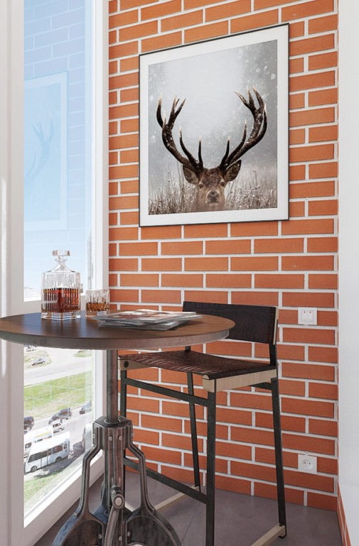 balkon met gevelbekleding van klinkertegels