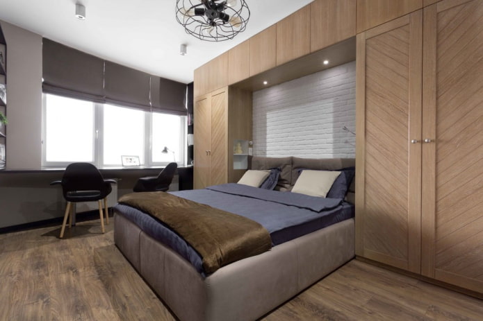 nis van kasten met een bed in het interieur