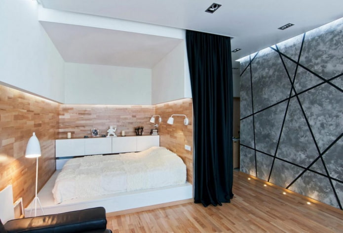 nis met een bed in het interieur van het appartement