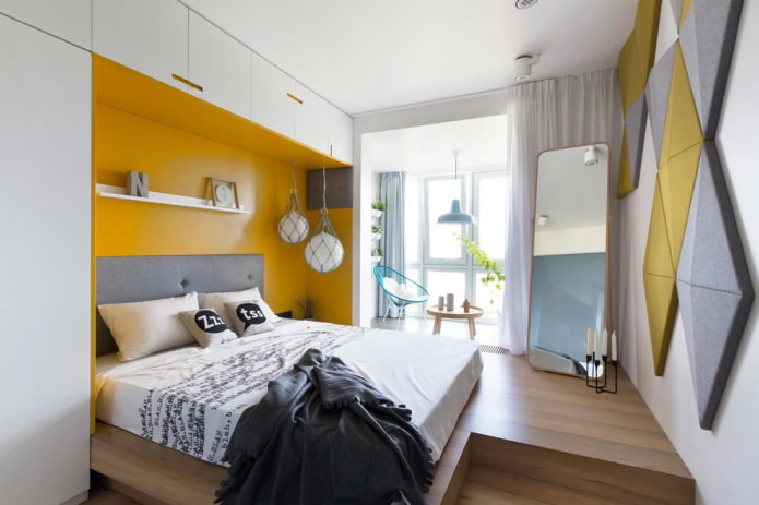 nis met een bed in het slaapkamerinterieur