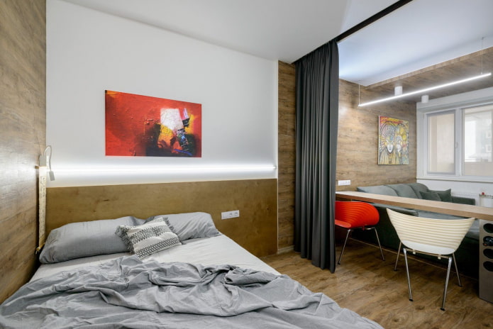 bed en bank in een eenkamerappartement