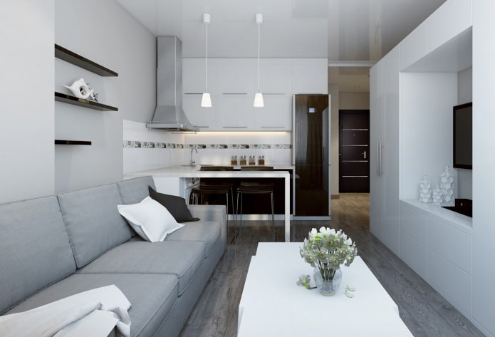 opstelling van de bank in het interieur van de keuken-woonkamer