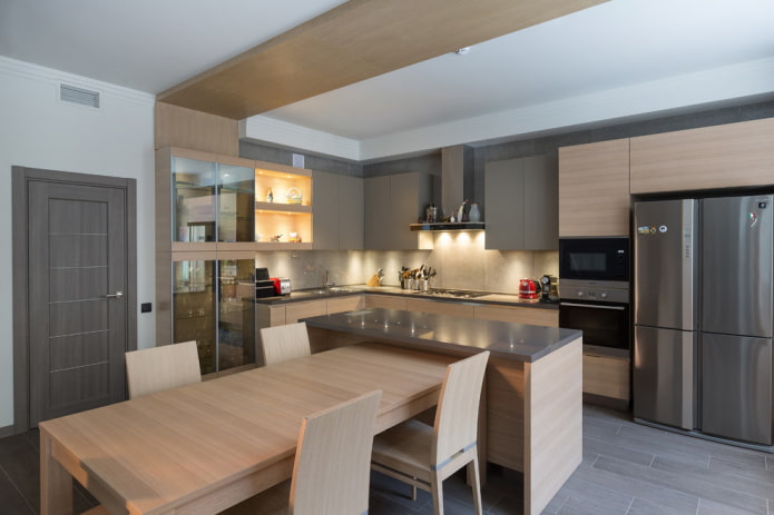 eiland met eettafel in het keukeninterieur
