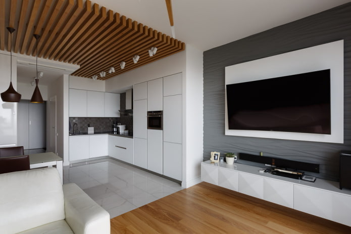 vloertegels in combinatie met laminaat in het interieur