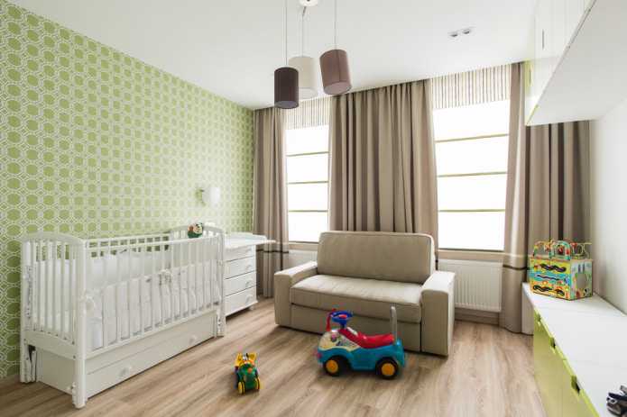 Groen behang in de kinderkamer voor een pasgeborene