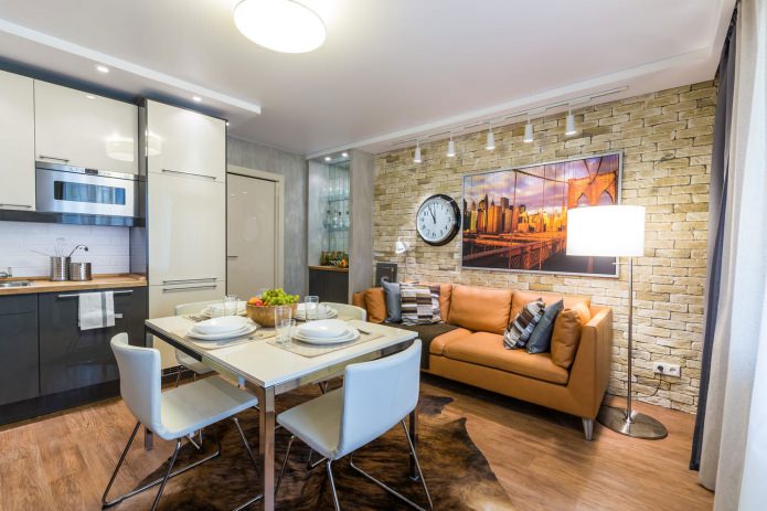 bakstenen behang in het interieur van de keuken-woonkamer