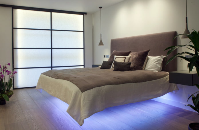 bed met zwevend effect en verlichting