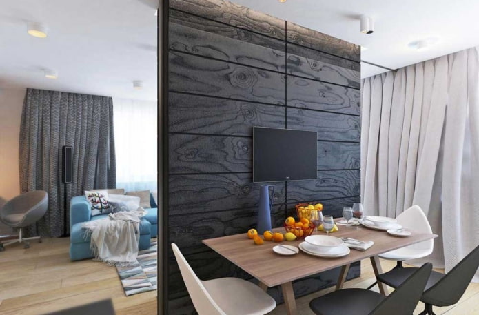 scheidingswand met tv in het interieur van de keuken-woonkamer