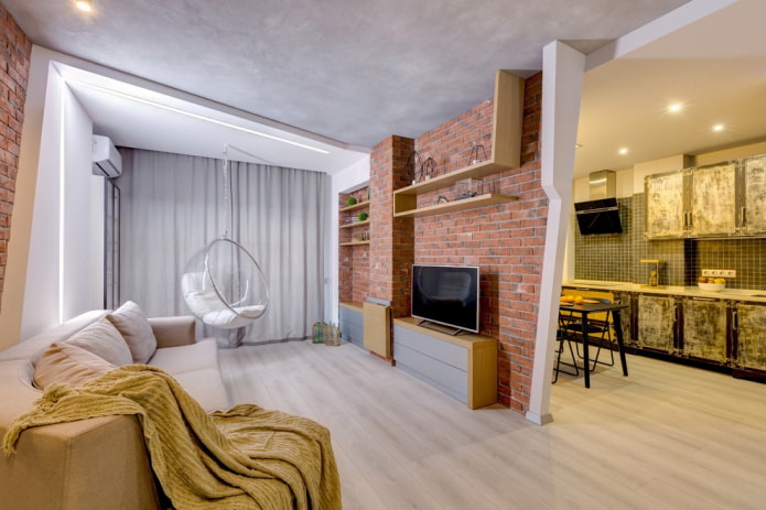 scheidingswand in het interieur van de keuken-woonkamer in loftstijl